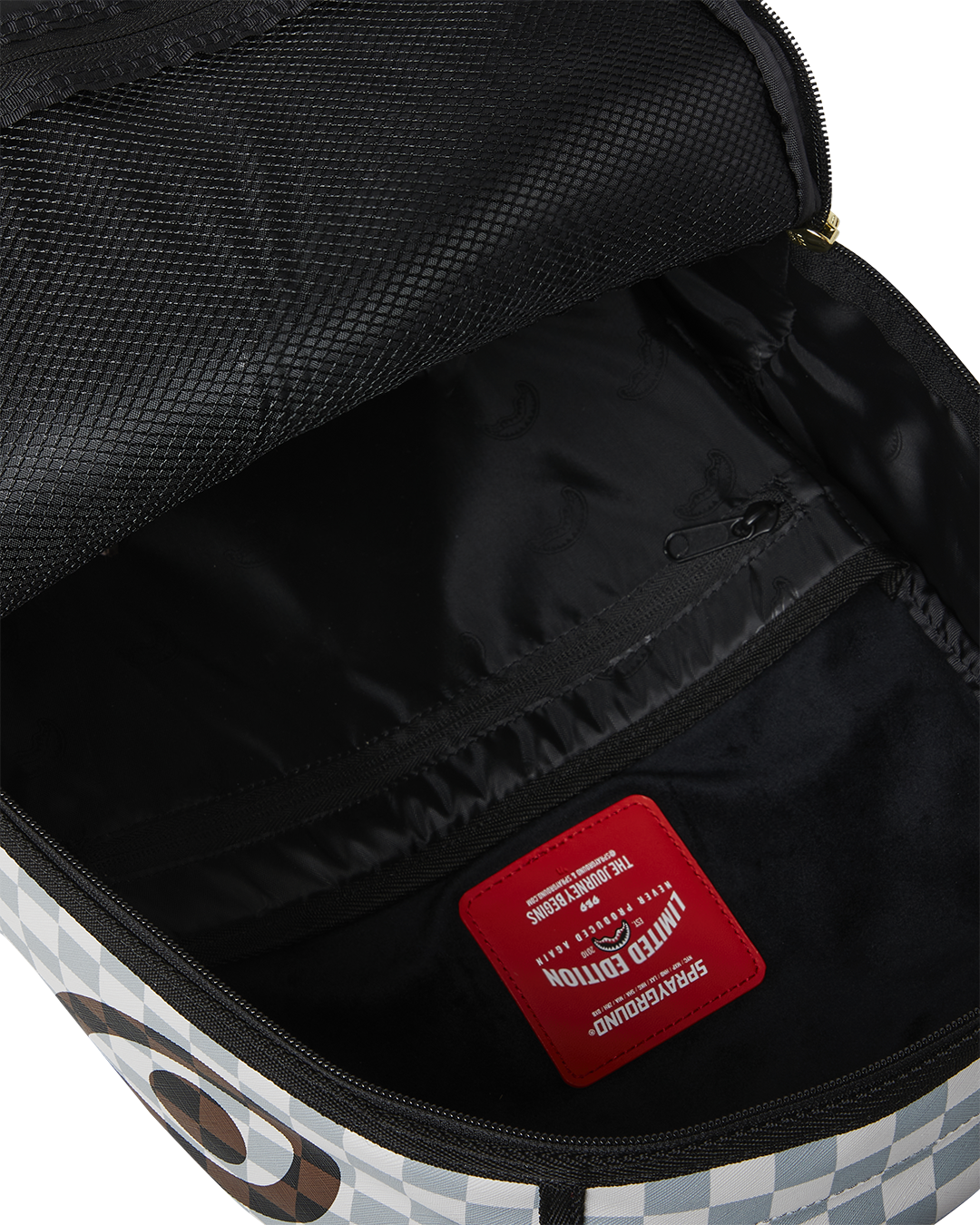 CREAM AND BROWN TEAR CHECK BACKPACK