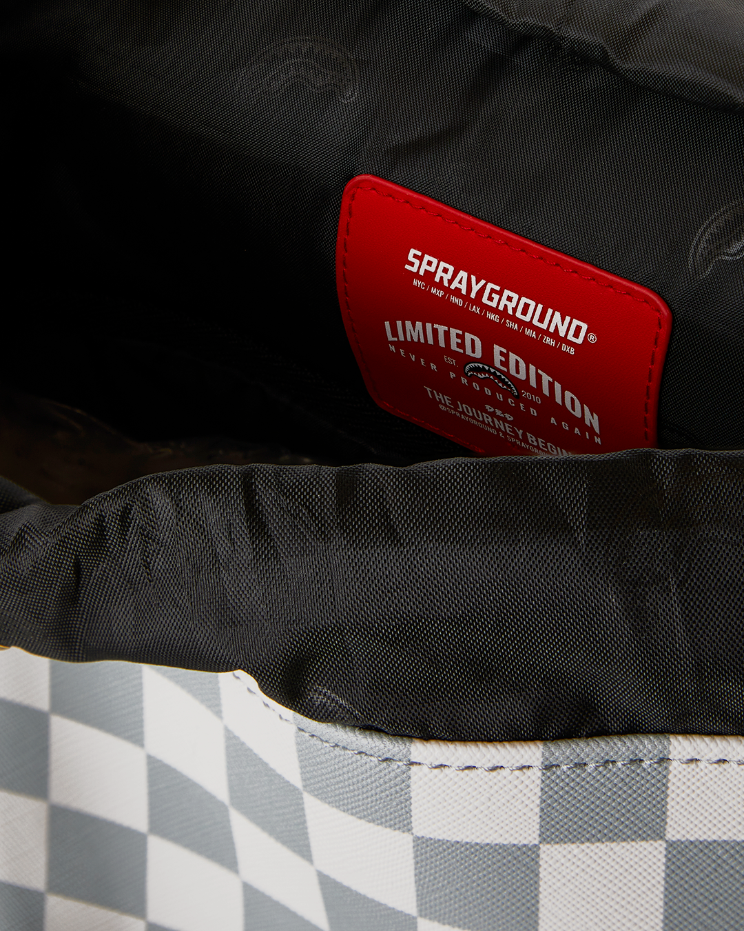 CREAM AND BROWN TEAR CHECK MONTE CARLO BACKPACK